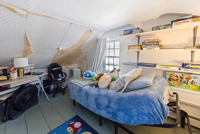 bedroom with wallpapered walls