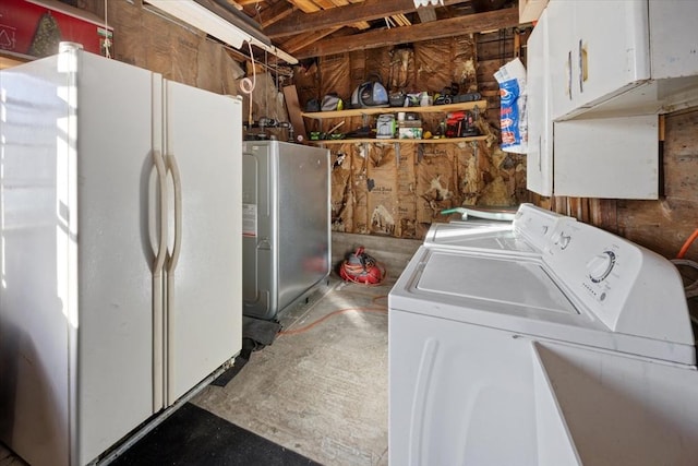 laundry area with cabinet space and washer and dryer