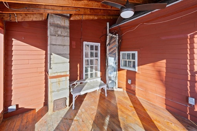 exterior space featuring ceiling fan