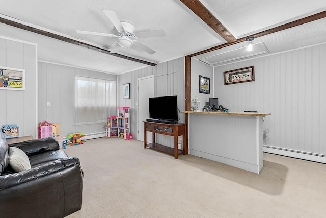 living area with beam ceiling, light carpet, attic access, ceiling fan, and a baseboard heating unit