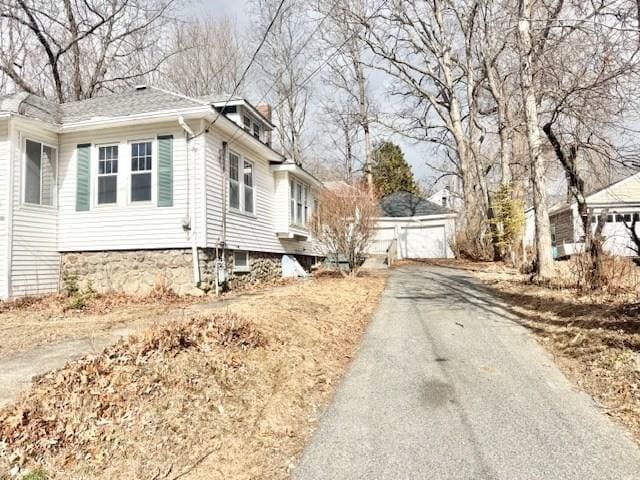 view of property exterior with a garage