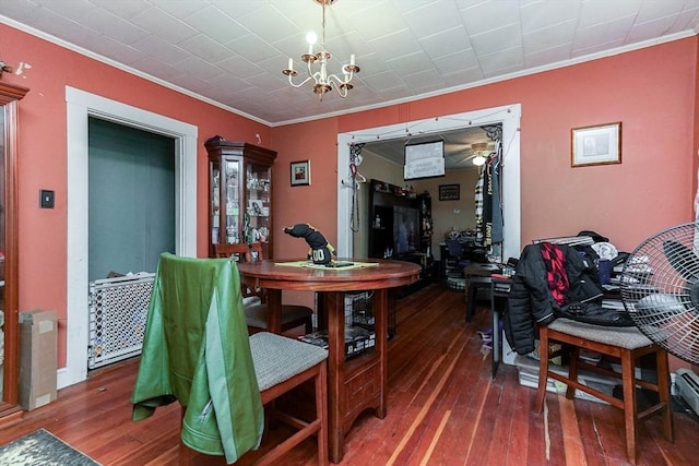 479 Main St, Hanson, MA 02341 - dining area with ornamental molding, hardwood / wood-style floors, and a chandelier