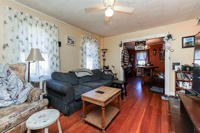 479 Main St, Hanson, MA 02341 - living area with crown molding, a ceiling fan, and wood-type flooring