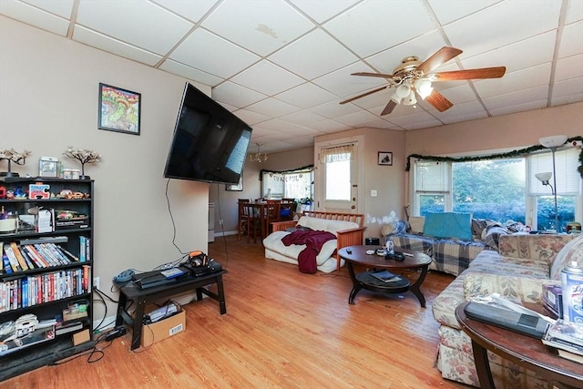 479 Main St, Hanson, MA 02341 - living area with a drop ceiling, wood finished floors, and a ceiling fan