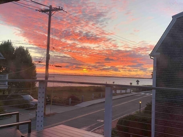 deck at dusk with a water view