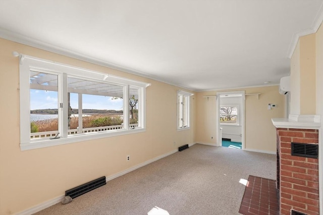 unfurnished living room with carpet, baseboards, and visible vents