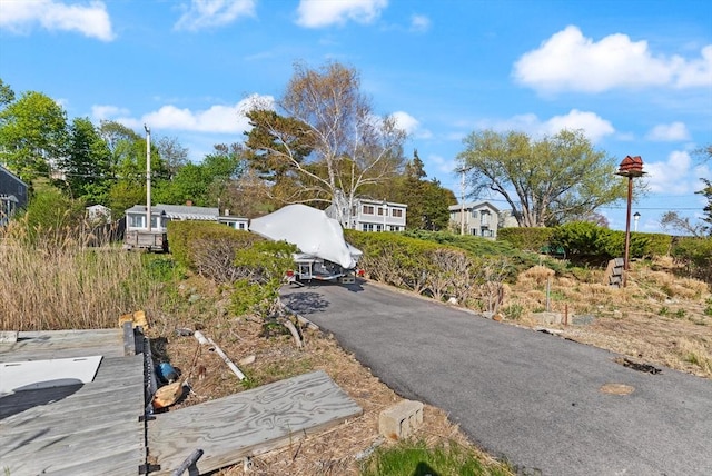 view of street featuring driveway