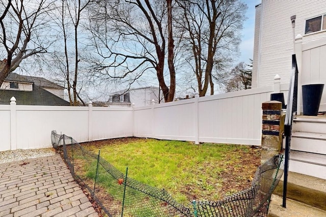 view of yard with a fenced backyard