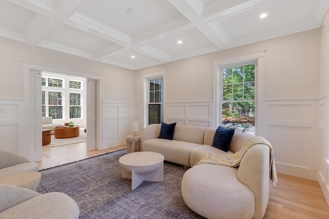 11 Cuba St, Andover, MA 01810 - living area with a wealth of natural light, beamed ceiling, and a decorative wall