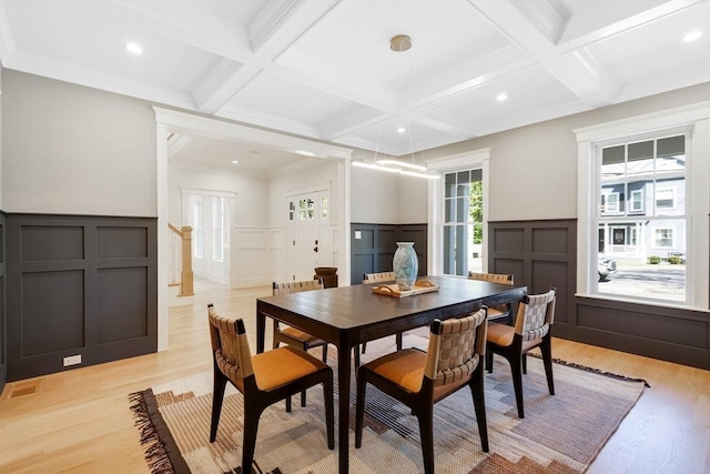 11 Cuba St, Andover, MA 01810 - dining room featuring coffered ceiling, light wood finished floors, and a decorative wall