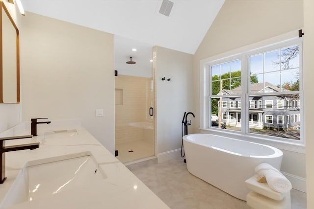 11 Cuba St, Andover, MA 01810 - bathroom featuring a stall shower, a freestanding bath, a sink, and vaulted ceiling