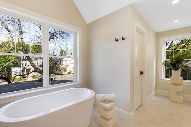 11 Cuba St, Andover, MA 01810 - full bathroom with a freestanding bath, lofted ceiling, baseboards, and recessed lighting