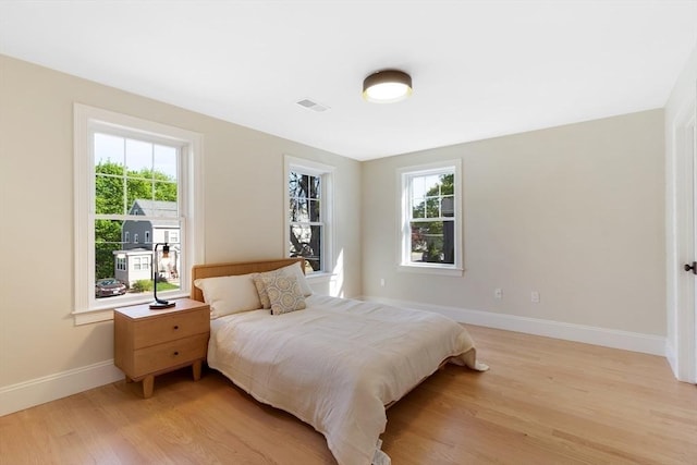11 Cuba St, Andover, MA 01810 - bedroom featuring baseboards, multiple windows, visible vents, and light wood-type flooring