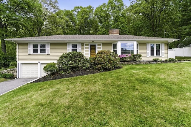 19 Mill Rd, Westborough, MA 01581 - ranch-style home featuring a chimney, driveway, a garage, and view of scattered trees