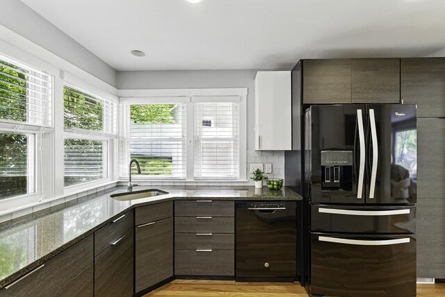 19 Mill Rd, Westborough, MA 01581 - kitchen featuring black appliances, a sink, dark stone counters, and dark brown cabinetry