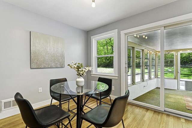 19 Mill Rd, Westborough, MA 01581 - dining space with healthy amount of natural light, wood finished floors, and baseboards