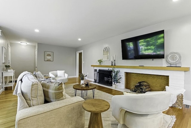19 Mill Rd, Westborough, MA 01581 - living area featuring a fireplace, recessed lighting, wood finished floors, and baseboards