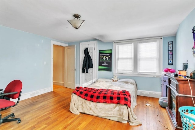 bedroom featuring hardwood / wood-style flooring