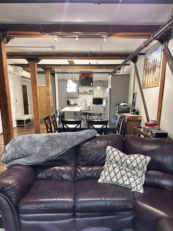 881 E 1st St Unit 303, Boston, MA 02127 - living room featuring wood finished floors