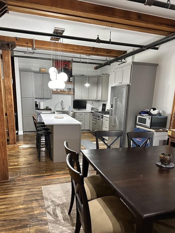 881 E 1st St Unit 303, Boston, MA 02127 - dining room featuring dark wood-type flooring