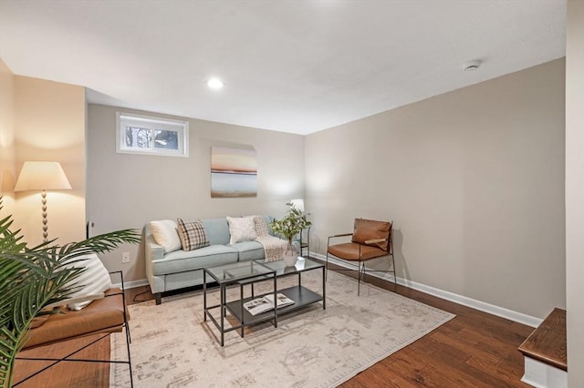 living room featuring recessed lighting, wood finished floors, and baseboards