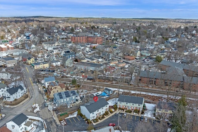 birds eye view of property with a residential view