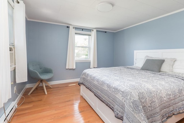 124 Skiff Ave Unit A-11, Tisbury, MA 02568 - bedroom with ornamental molding and light wood-type flooring