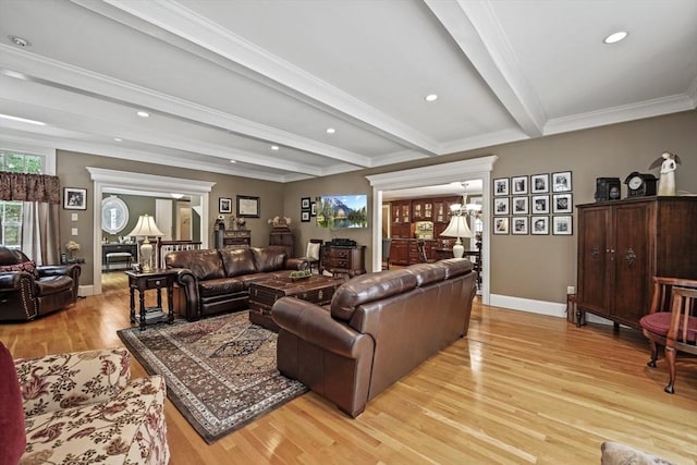 living room with baseboards, ornamental molding, light wood-type flooring, beam ceiling, and recessed lighting