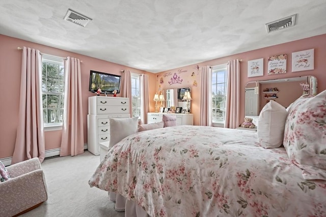 bedroom featuring visible vents, light carpet, and multiple windows