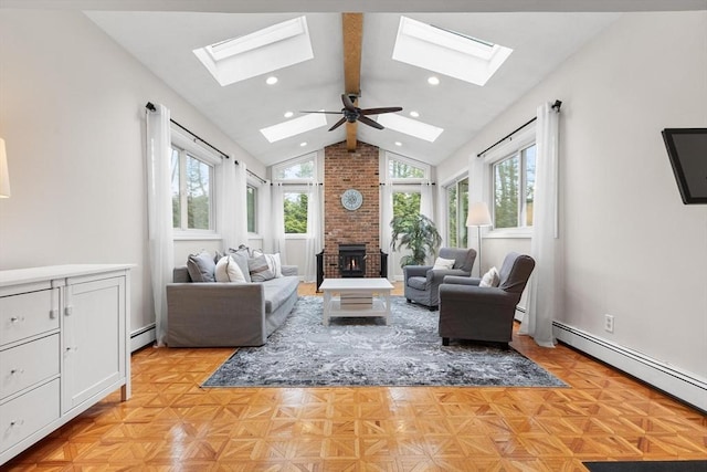 living room with lofted ceiling with skylight, recessed lighting, a brick fireplace, and a baseboard radiator