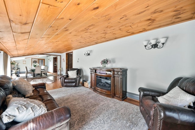 living room with lofted ceiling, wood ceiling, and wood-type flooring