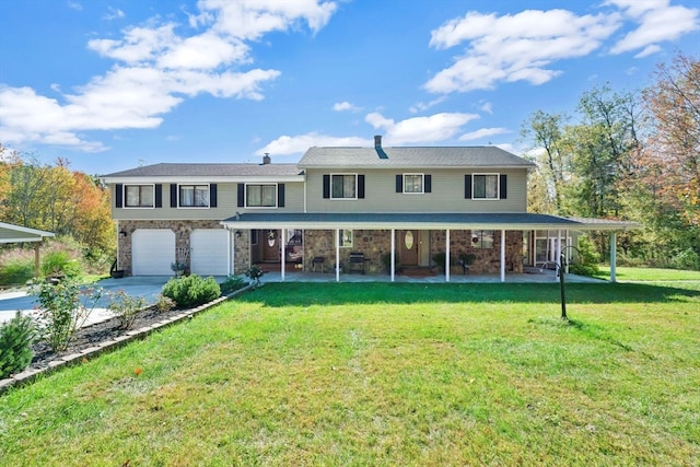 view of front of property featuring a garage and a front yard