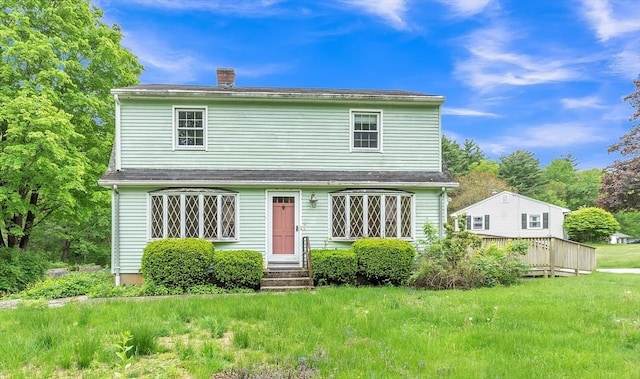 45 Alpine Dr, Southbridge, MA 01550 - view of front of home with a chimney and a front yard