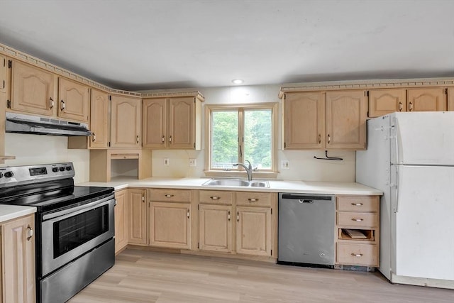 45 Alpine Dr, Southbridge, MA 01550 - kitchen with stainless steel appliances, light brown cabinets, under cabinet range hood, a sink, and recessed lighting