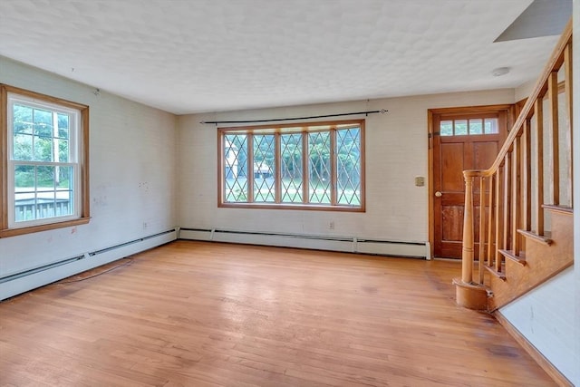 45 Alpine Dr, Southbridge, MA 01550 - entrance foyer with plenty of natural light, light wood-style floors, and stairs