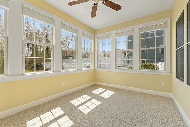 2 Rich Rd, Milford, MA 01757 - unfurnished sunroom featuring carpet floors, baseboards, and plenty of natural light