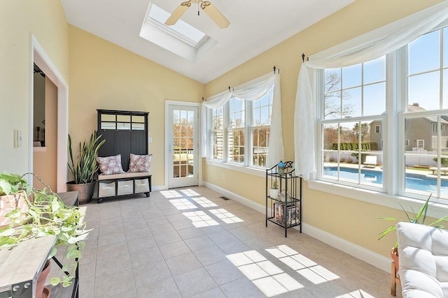 2 Rich Rd, Milford, MA 01757 - sunroom / solarium featuring tile patterned floors, baseboards, and vaulted ceiling with skylight