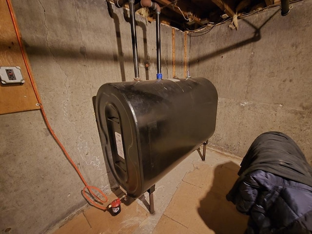 utility room with oil tank