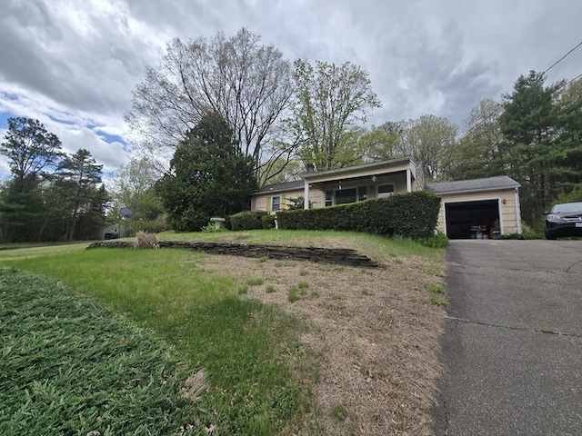 view of front of home with an attached garage and driveway