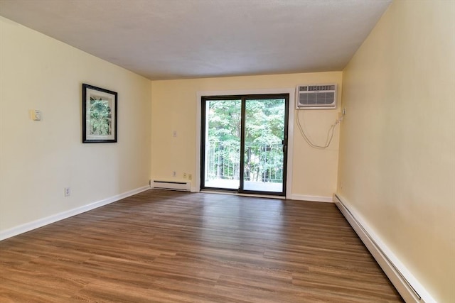 915 Edgell Rd Unit 85, Framingham, MA 01701 - empty room featuring a baseboard heating unit, a baseboard radiator, wood finished floors, and a wall mounted air conditioner