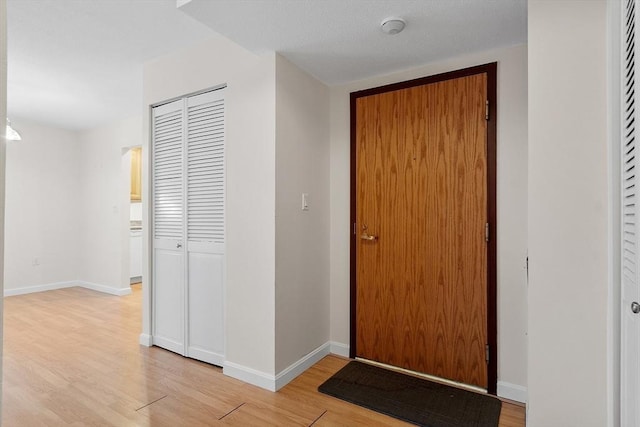 foyer featuring light hardwood / wood-style flooring