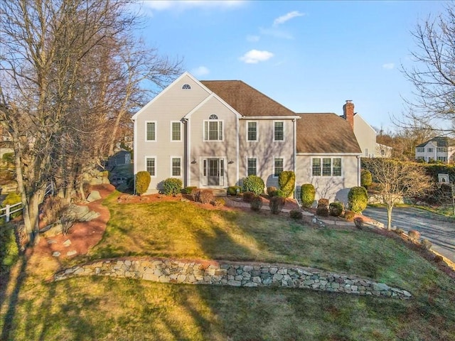 view of front of home with a front yard