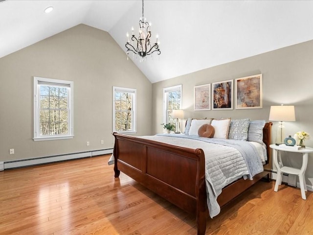 bedroom featuring a baseboard radiator, high vaulted ceiling, an inviting chandelier, and light hardwood / wood-style floors