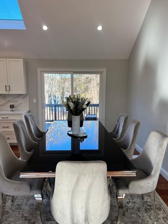 dining room featuring recessed lighting, baseboards, and dark wood-type flooring