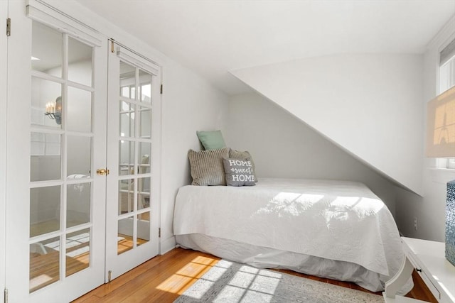 bedroom featuring wood finished floors