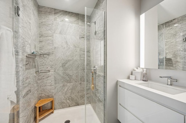 133 Seaport Blvd Unit 823, Boston, MA 02210 - bathroom with a tile shower and vanity