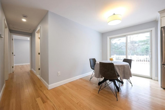 44 Dean Rd, Wayland, MA 01778 - dining space with light wood-style flooring and baseboards