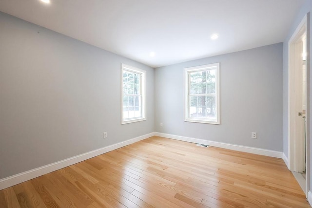 44 Dean Rd, Wayland, MA 01778 - empty room featuring light wood finished floors, baseboards, and recessed lighting