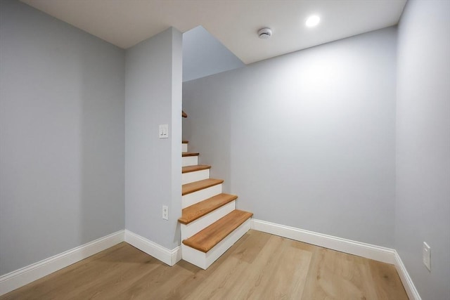 44 Dean Rd, Wayland, MA 01778 - stairs with wood finished floors, baseboards, and recessed lighting