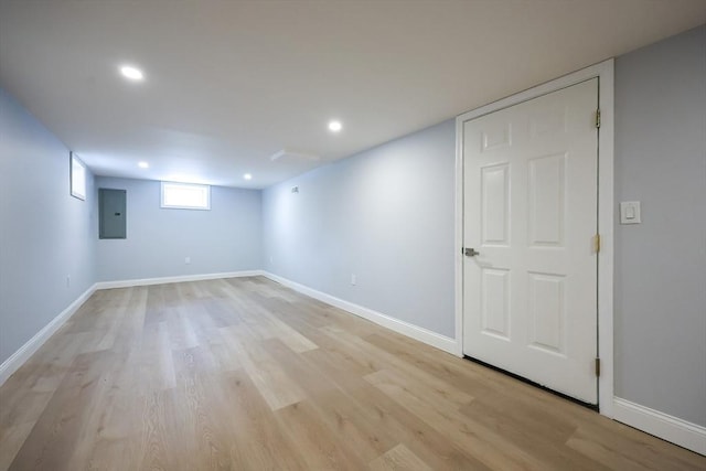 44 Dean Rd, Wayland, MA 01778 - below grade area with electric panel, light wood finished floors, recessed lighting, and baseboards